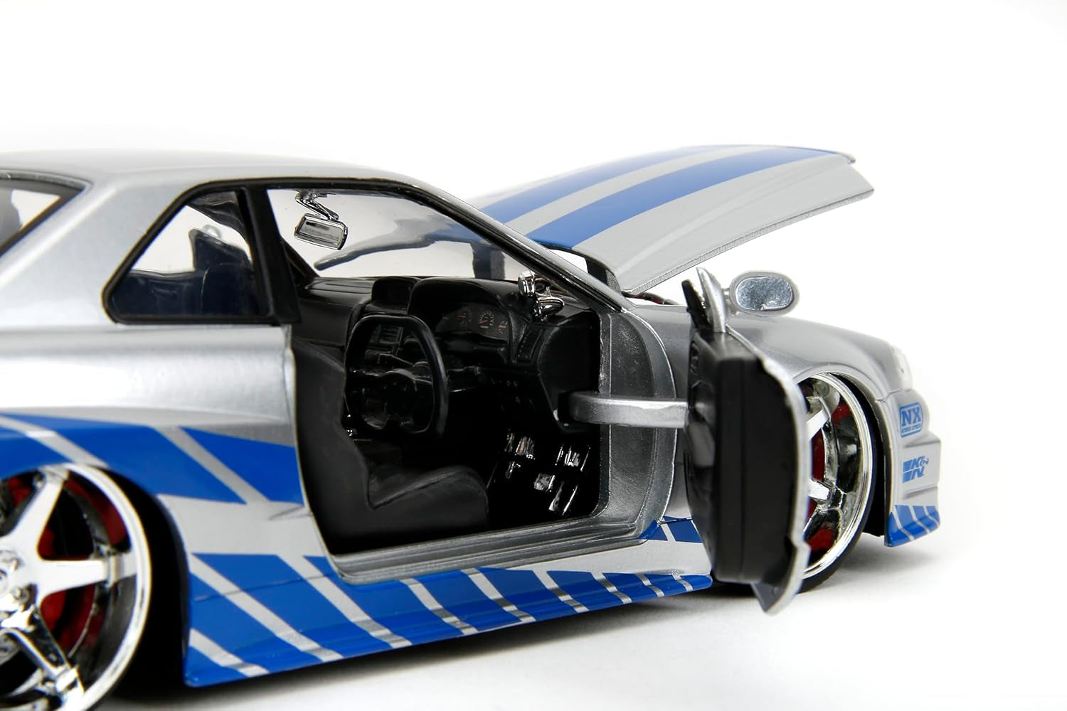 Toys Fast & Furious Brian’S 2002 Nissan Skyline R34 Die-Cast Car, 1:24 Scale, Silver & Blue