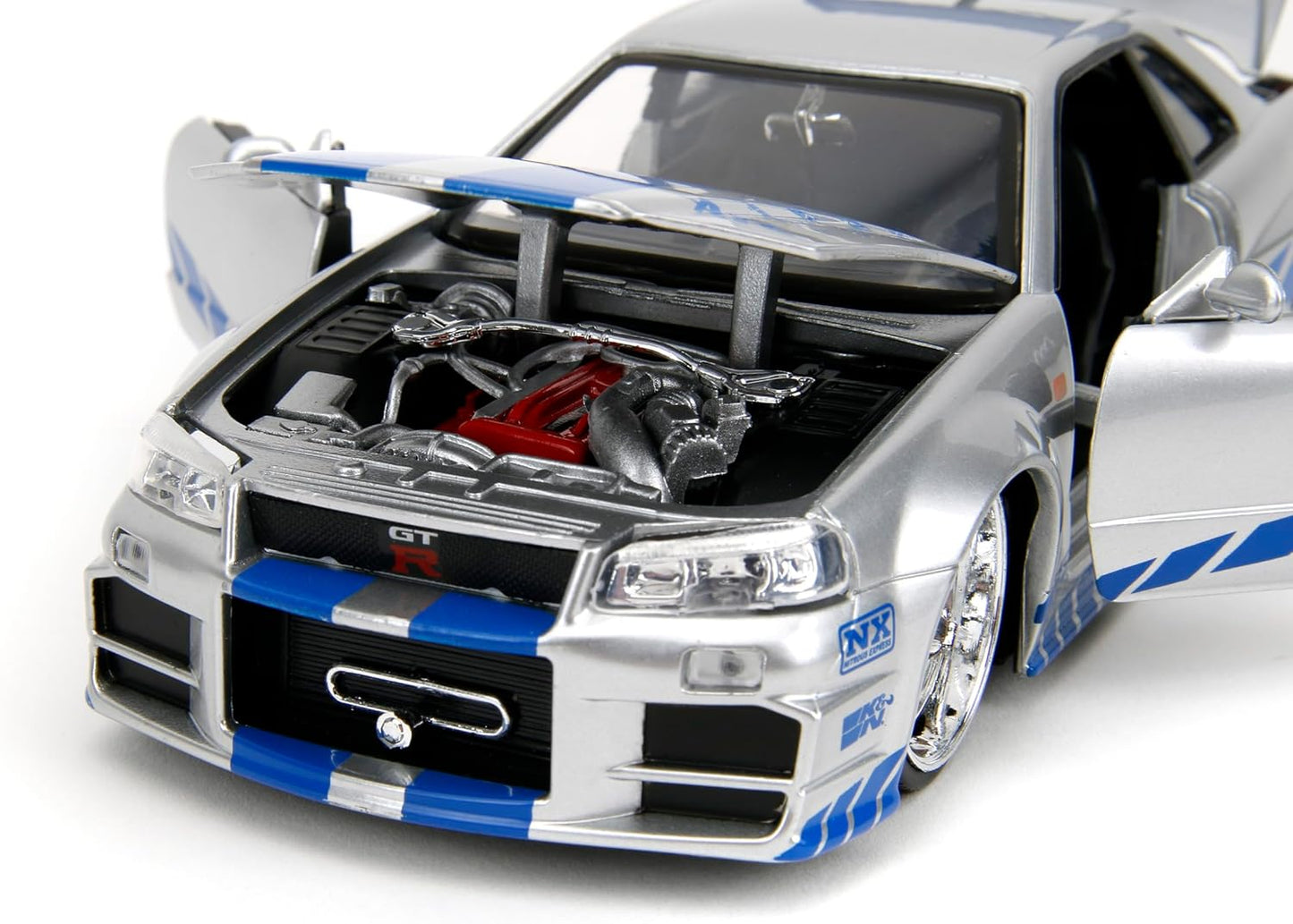 Toys Fast & Furious Brian’S 2002 Nissan Skyline R34 Die-Cast Car, 1:24 Scale, Silver & Blue